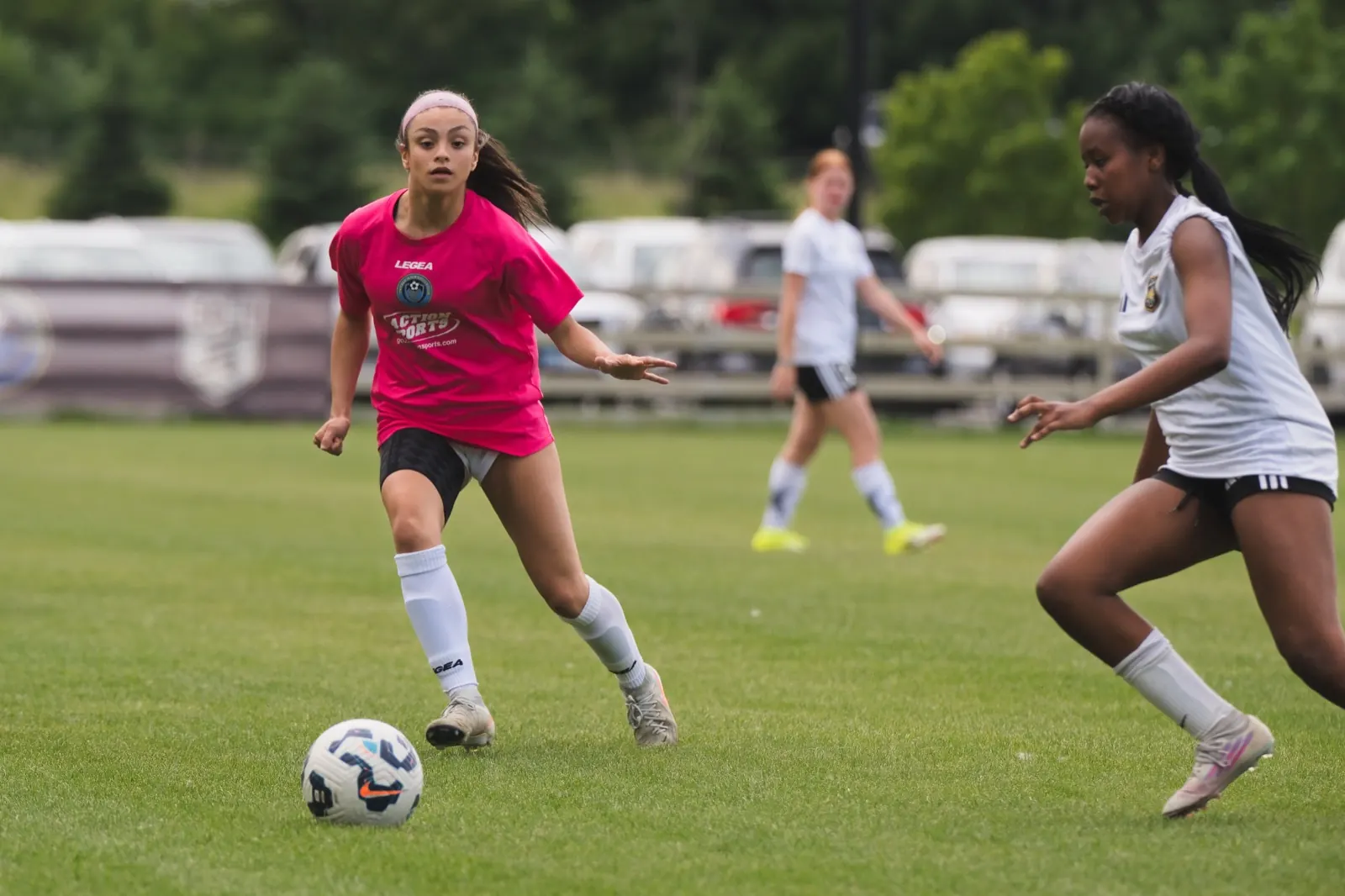 Amaya Vargas driving at a defender with the ball